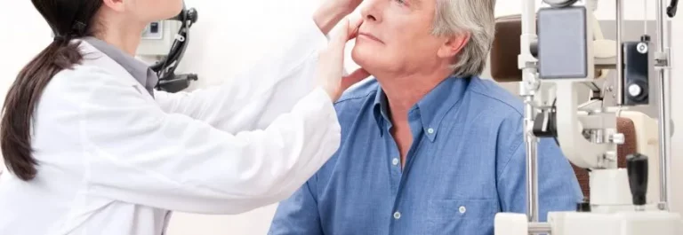 Retina doctor examining a patient with diabetic retinopathy